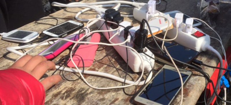 The camp’s charging station is always busy.